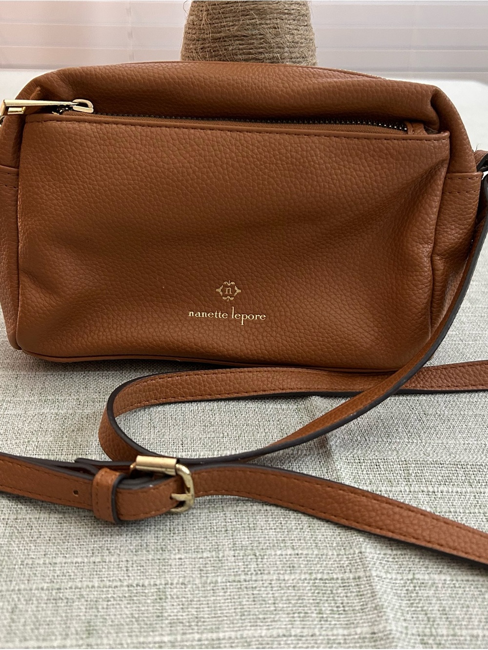 Nanette Lepore Tan VEGAN  Crossbody Bag with Gold Hardware.